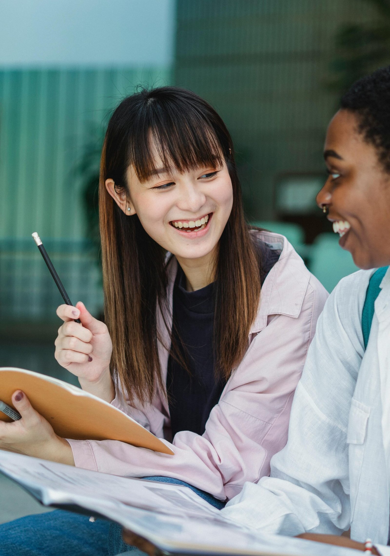 Women studying together in a collaborative learning environment